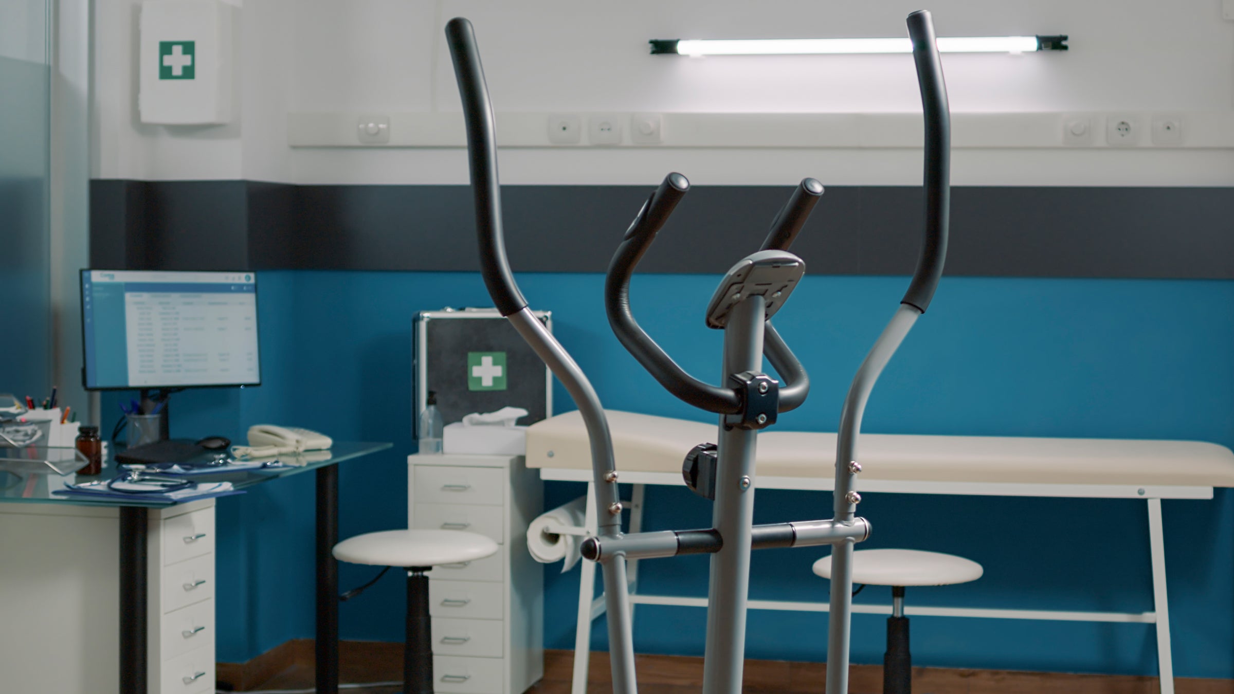 Physical therapist's office with therapy machine in front