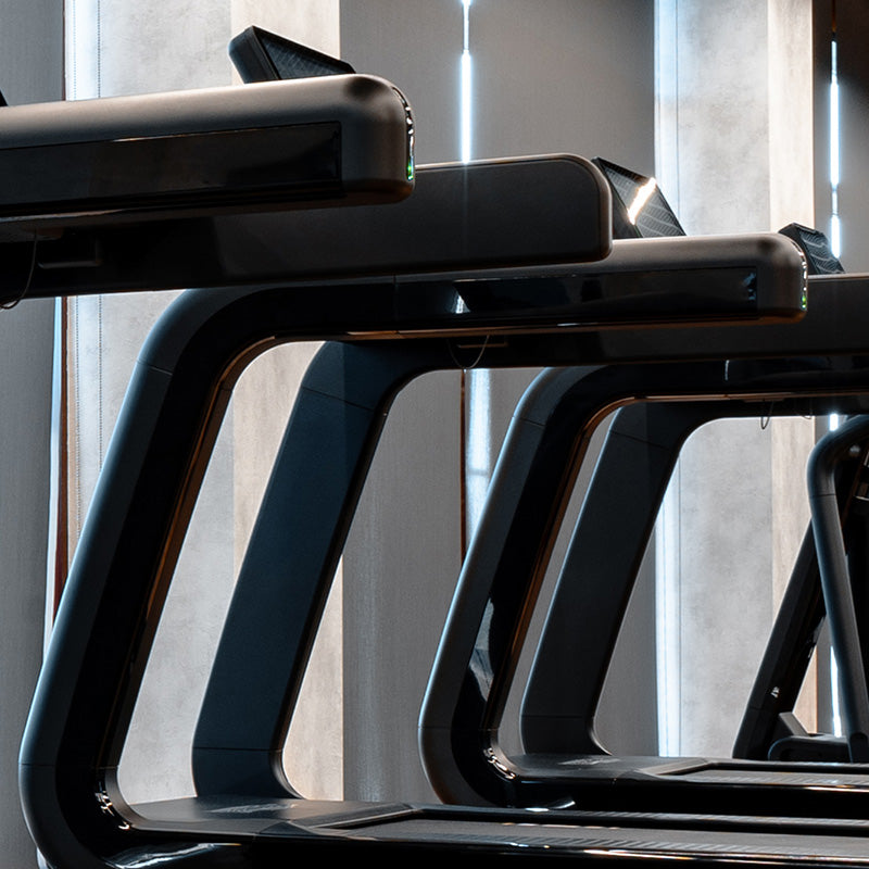 mobile view of closeup of resistance machine benches in a fitness studio