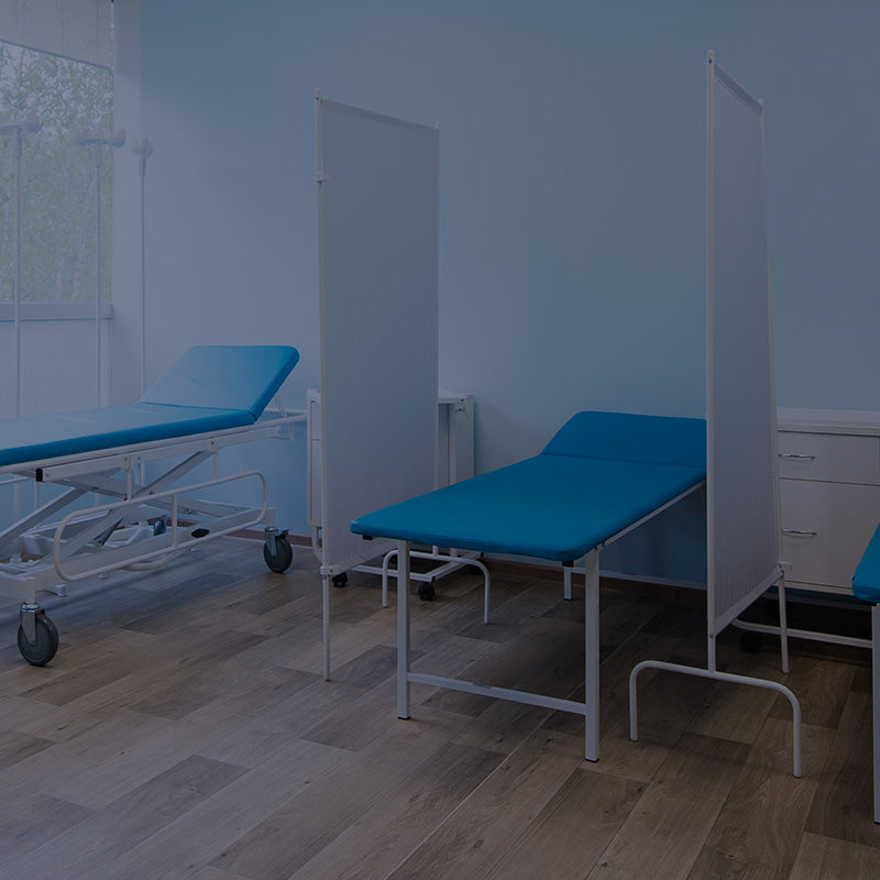 mobile friendly healthcare beds in blue hospital room